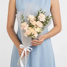 9 Коричневых Гвоздик в упаковке